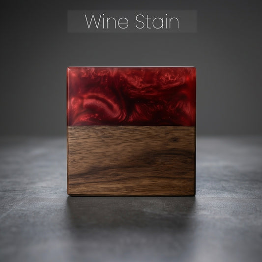 Square wood block with epoxy resin top on a gray surface