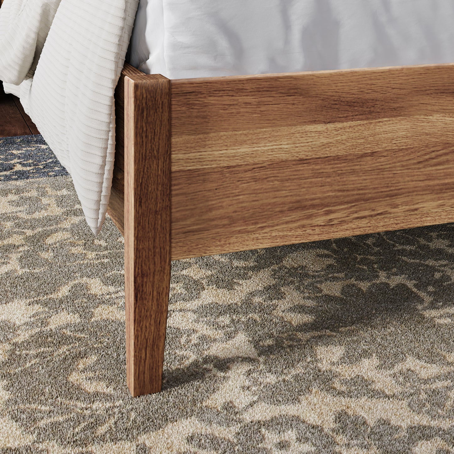 close up image of leg from an oak bed frame