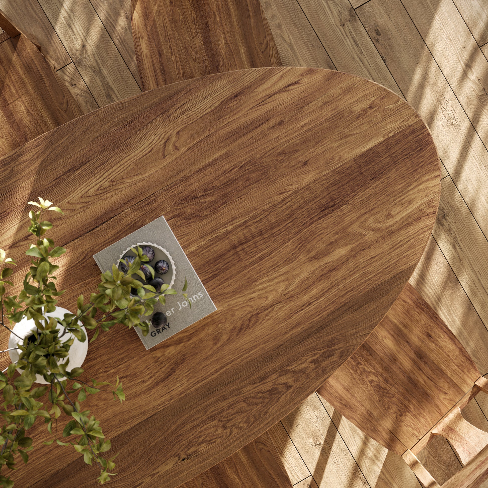 Top-down view of an oak oval dining table