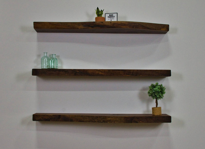 http://brickmillfurniture.com/cdn/shop/products/live-edge-shelves-floating-wood-shelf-walnut-424485_800x.jpg?v=1700830115