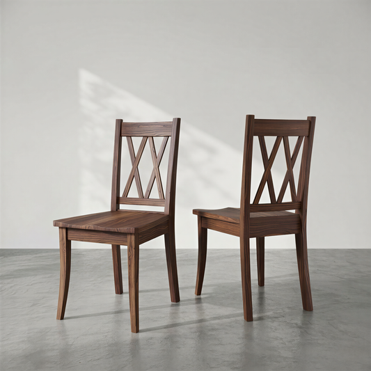Two wooden chairs with a cross-back design on a gray floor and light gray background