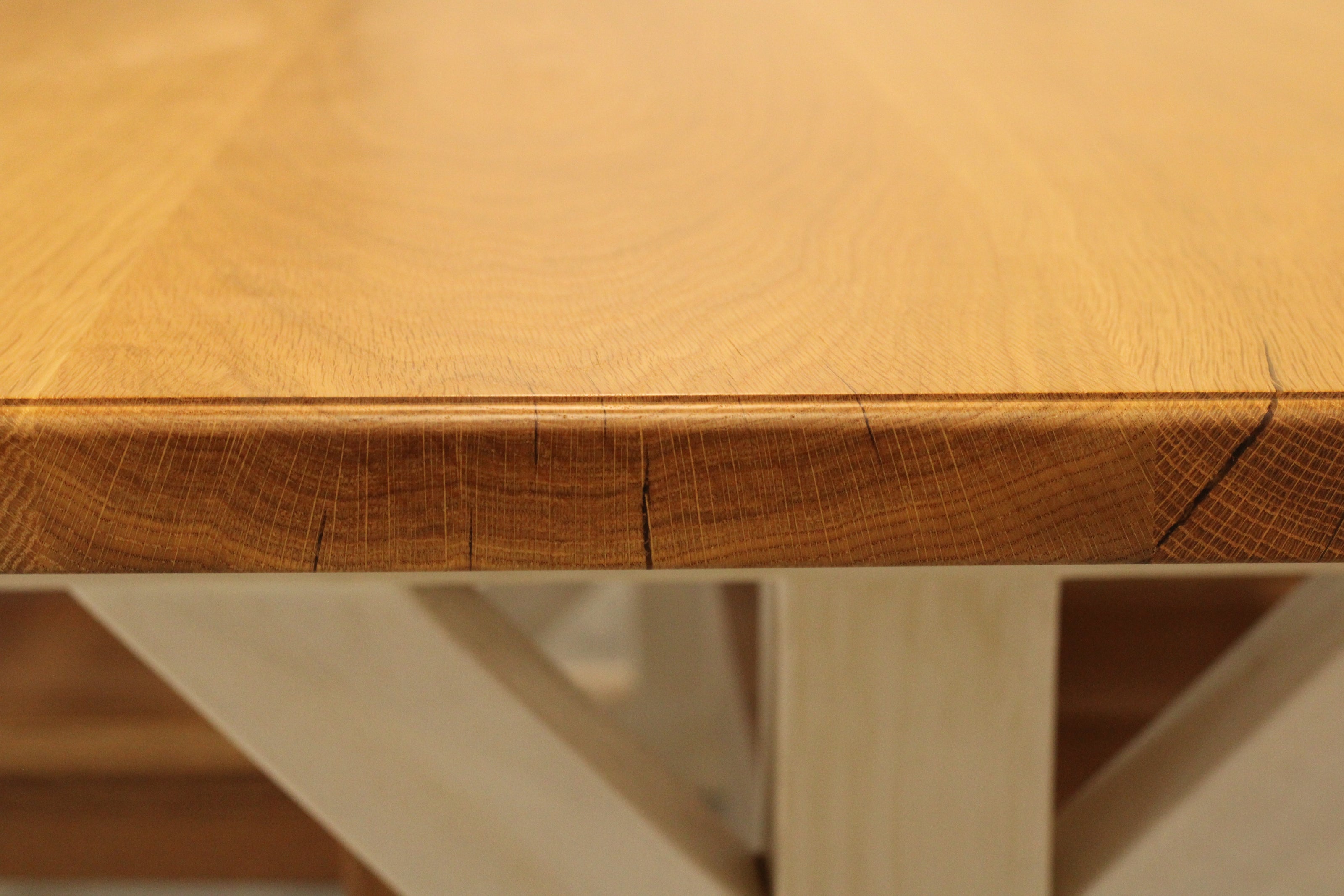 Close-up of a wooden table with visible grain and texture
