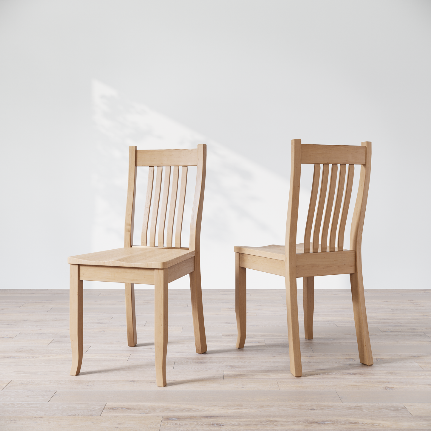Two Maple wooden dining chairs, one facing forward and the other showing the side profile.