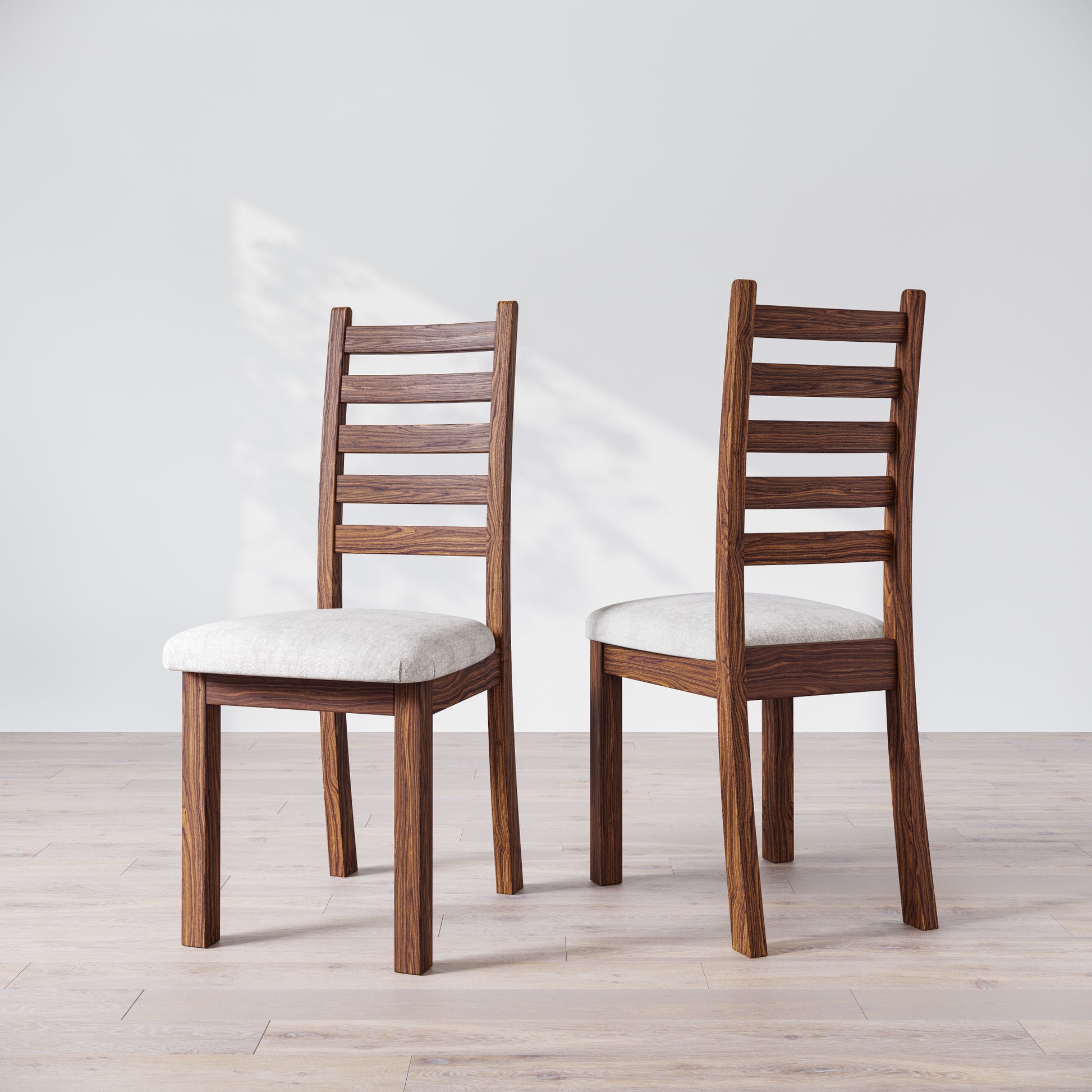 Two wooden dining chairs with a commercial grade finish and upholstered seats, displayed against a white background.