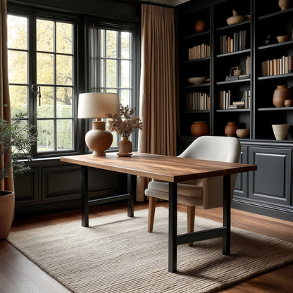 Modern home office with wooden desk, white chair, and bookshelves.