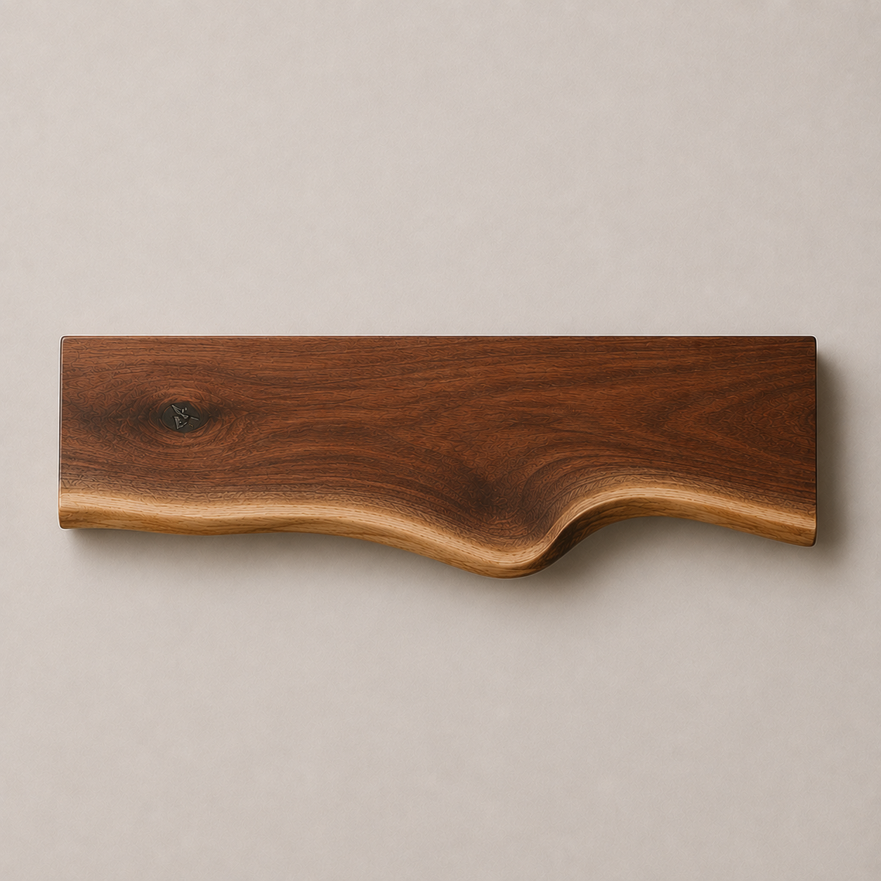 A rectangular wooden board with a live edge and natural grain, displayed against a neutral light gray background.