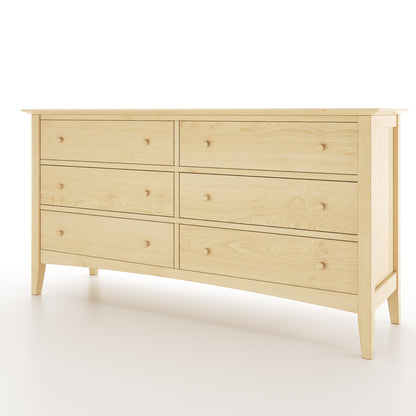 Angled view of a maple dresser on white background