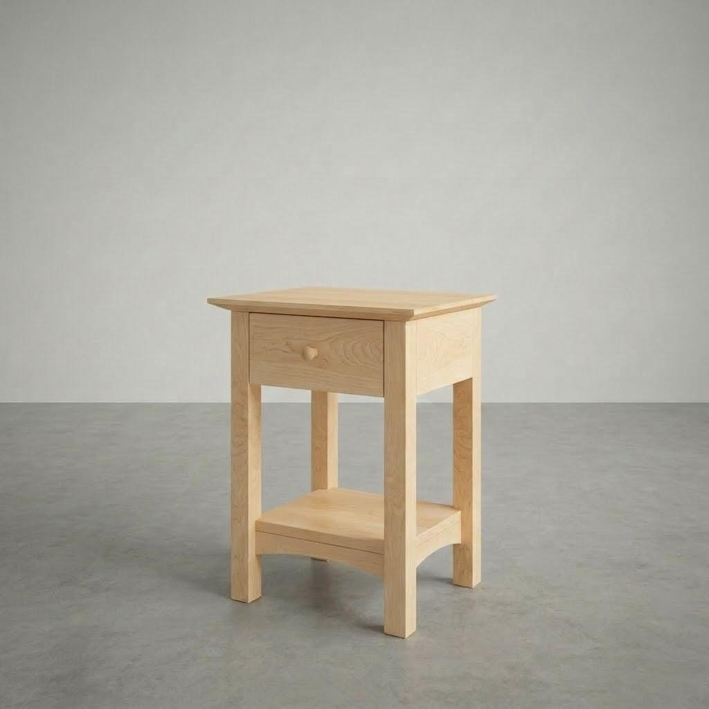 Wooden side table with a drawer on a gray background