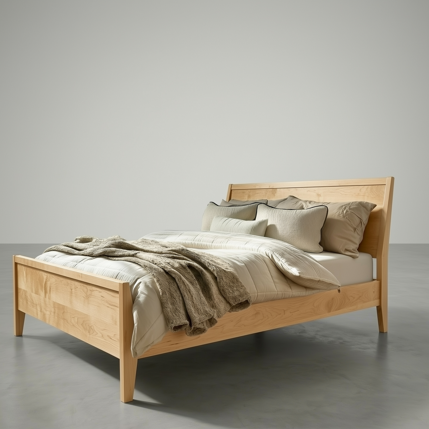 Wooden bed with beige bedding and pillows against a gray background