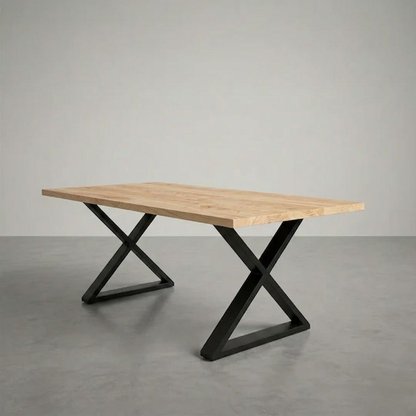 Wooden table with black metal legs on a gray floor and background