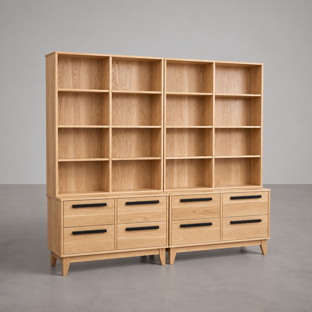 Oak Ashbury sectional bookcase in a large empty space