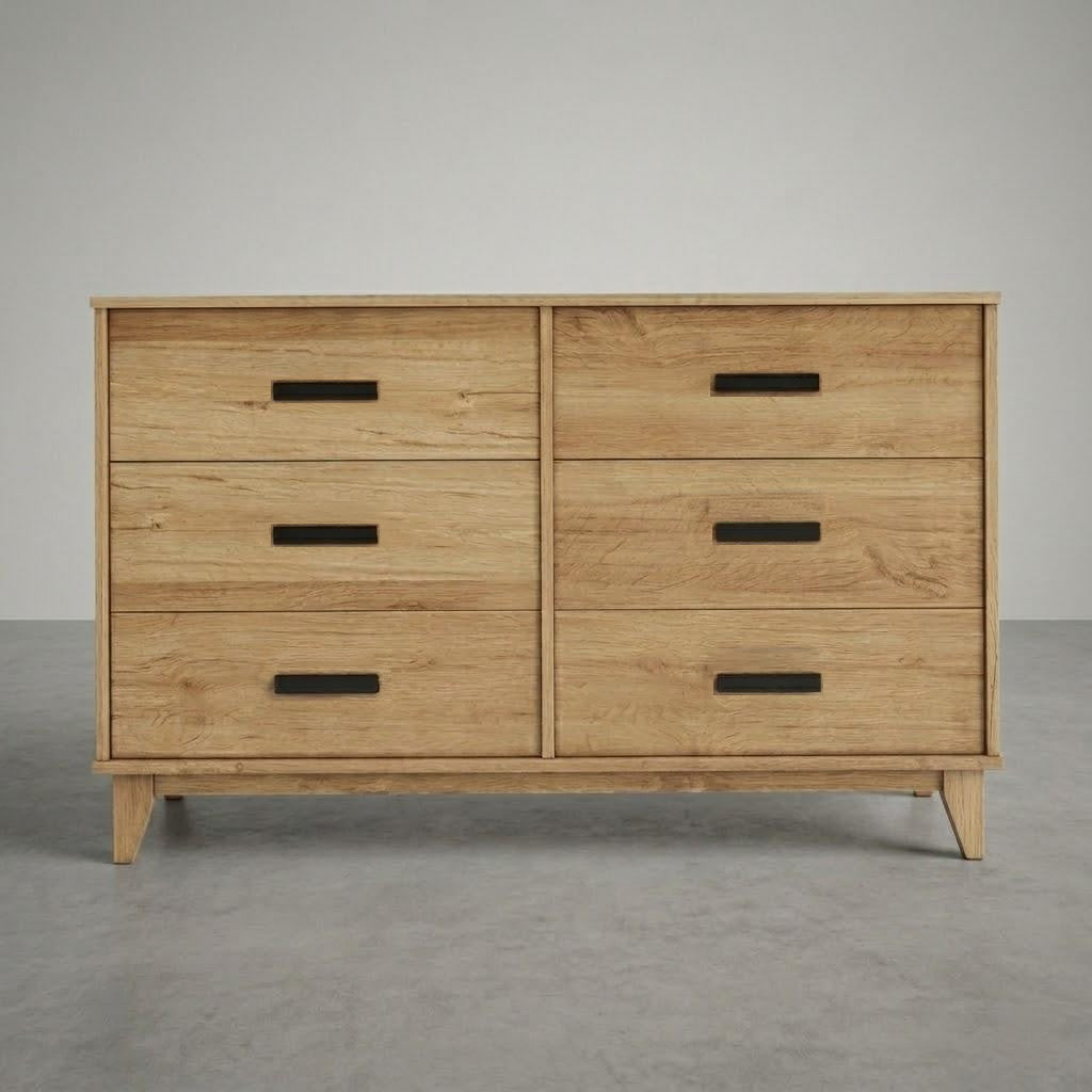 Wooden dresser with four drawers on a gray background
