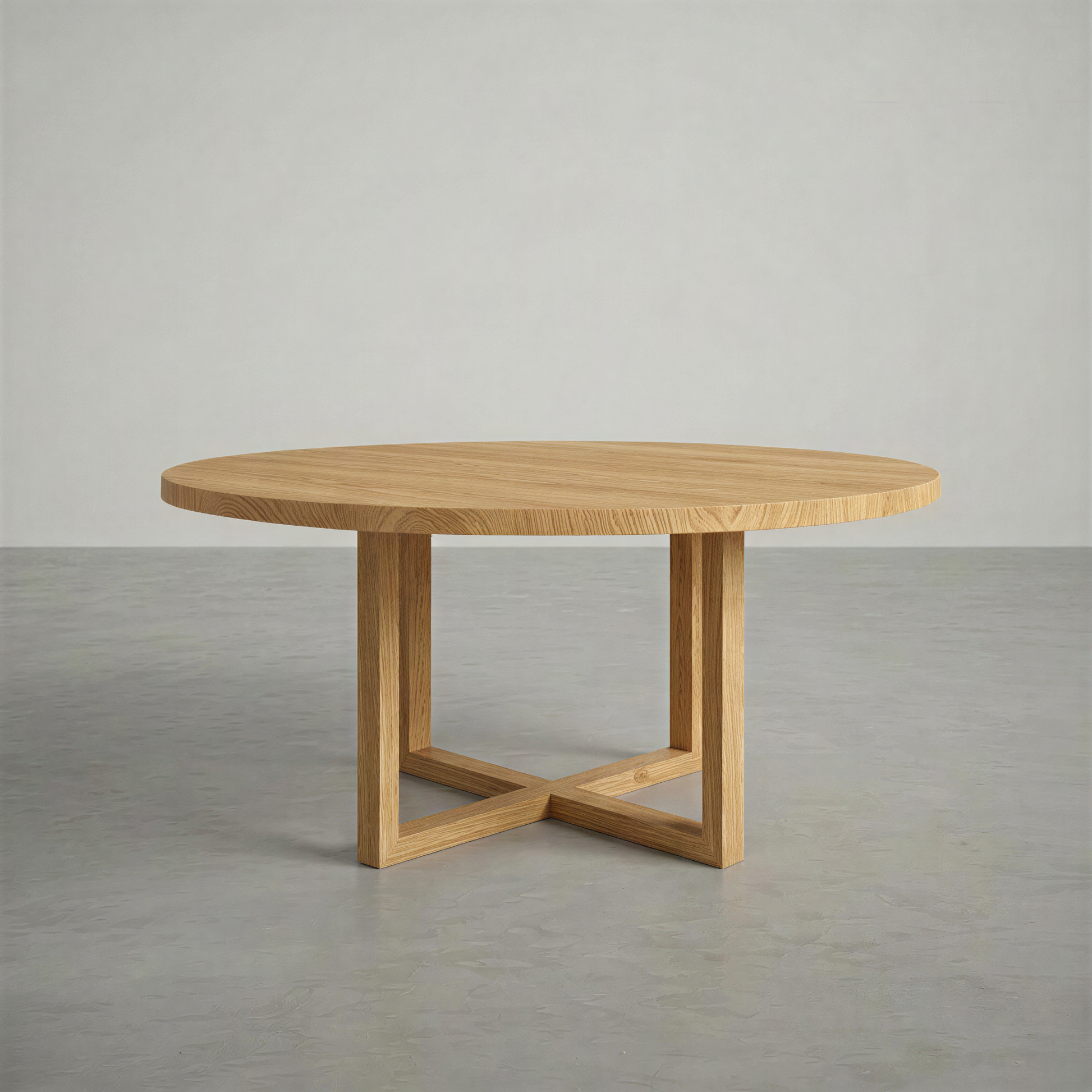 Round dining room table in a big empty space