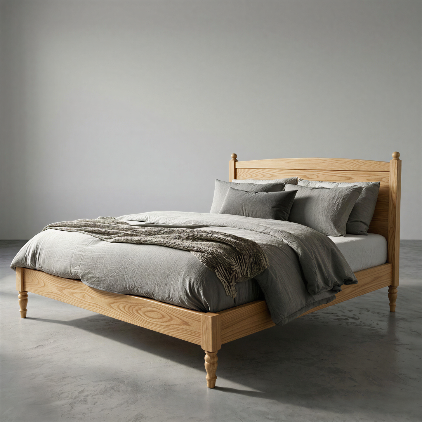 Wooden bed with gray bedding in a minimalistic room