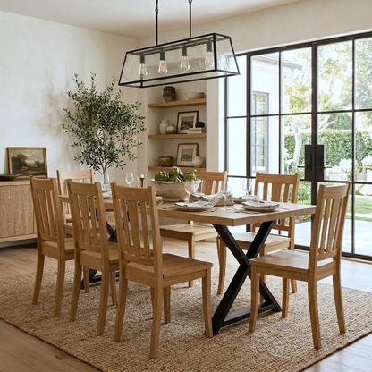 Dining room with wooden table and chairs, large window, and decorative elements.