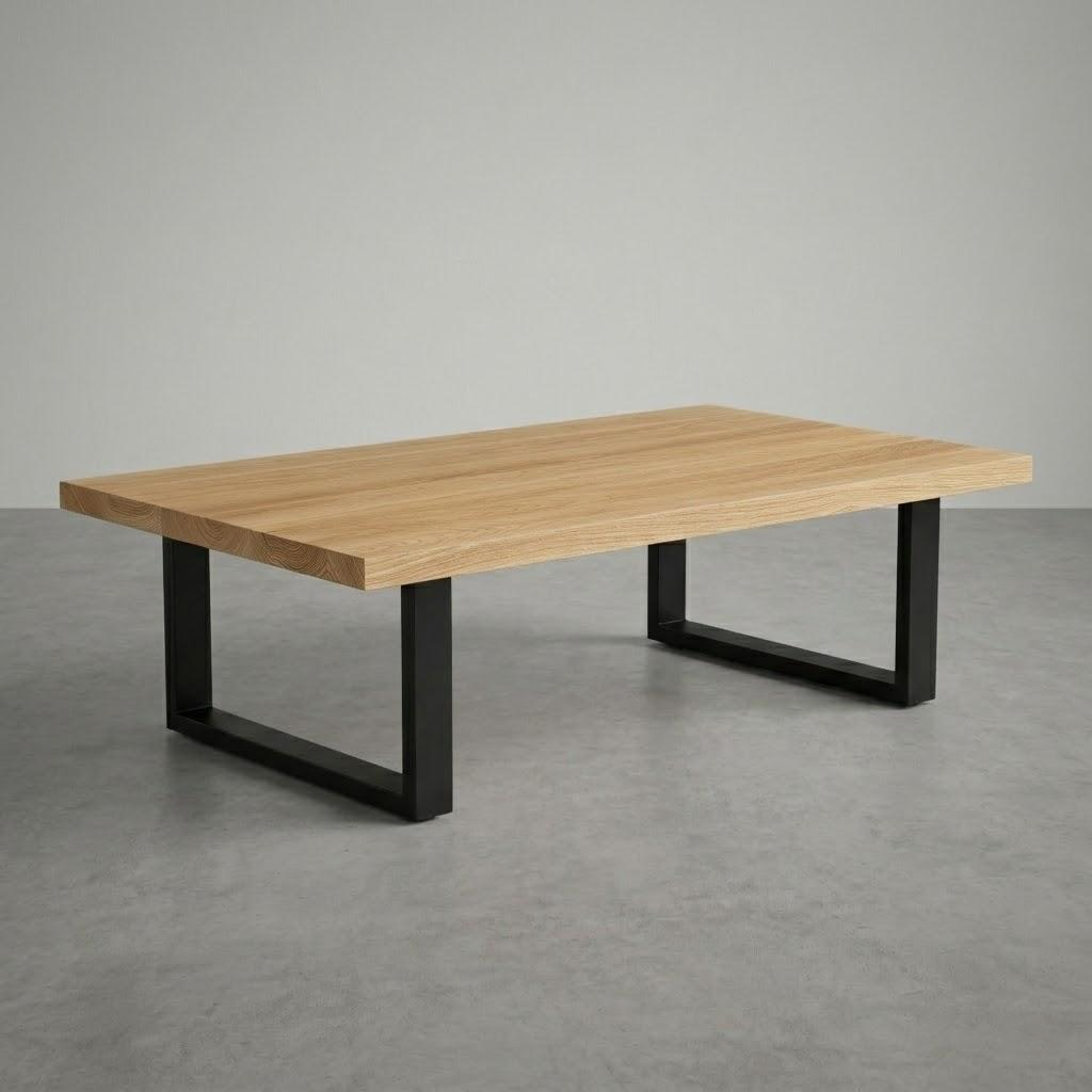 Wooden table with black metal legs on a gray floor and background