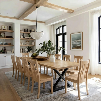 Dining room with wooden table and chairs, large window, and decorative elements.