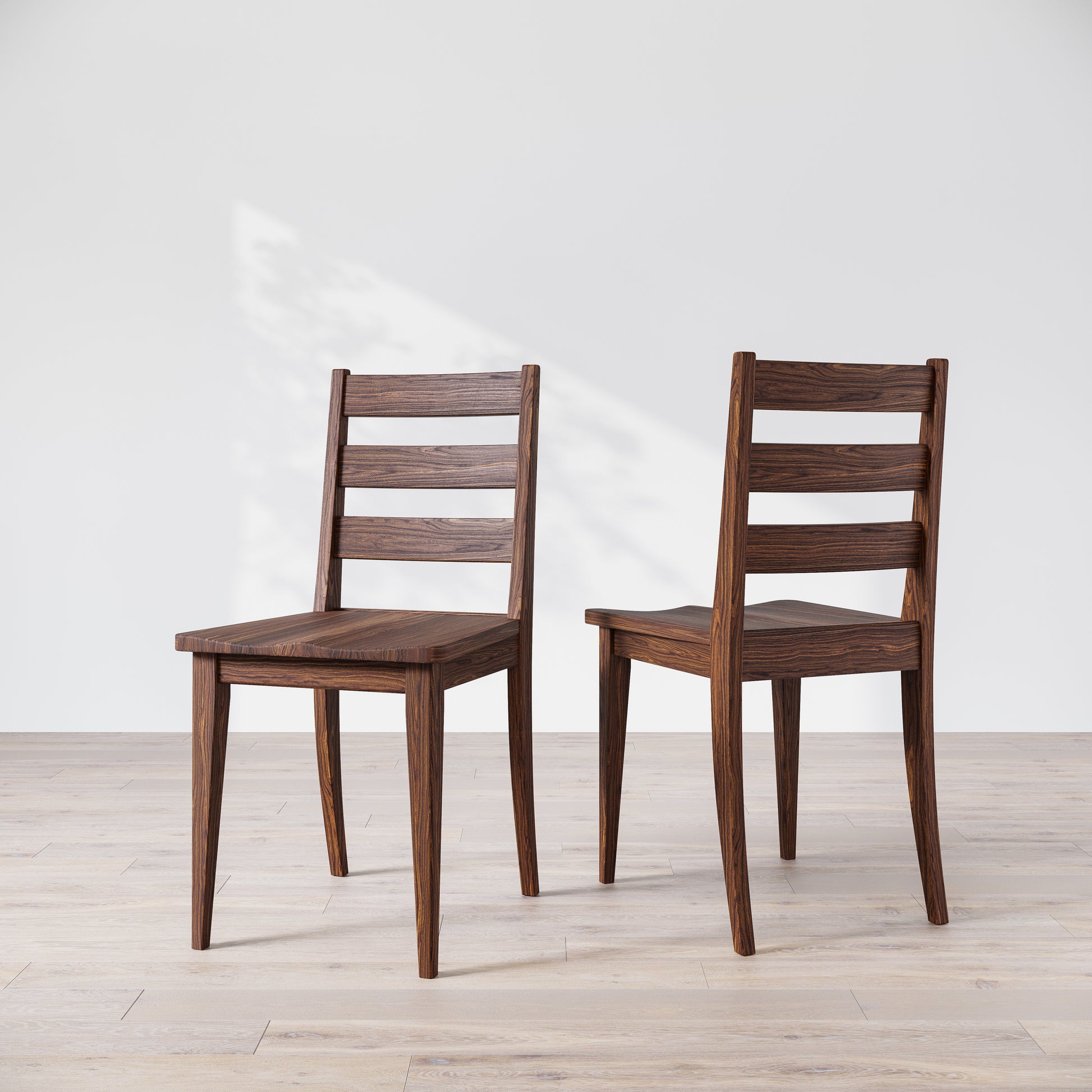 Two wooden dining chairs with a dark finish, featuring a simple, solid backrest and seat design on a light background.