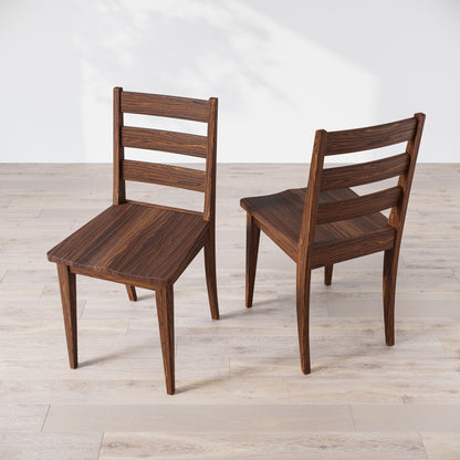 Two wooden dining chairs with a dark finish, featuring a simple, solid backrest and seat design on a light background.