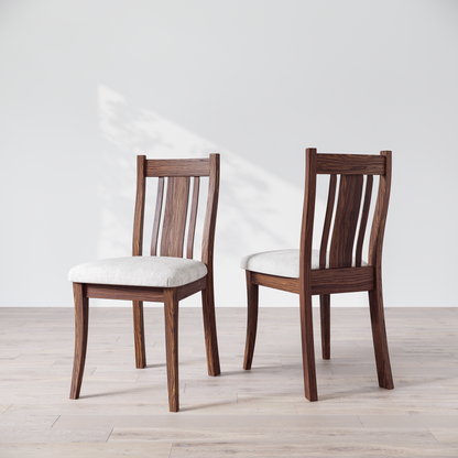 Upholstered walnut chair on white background