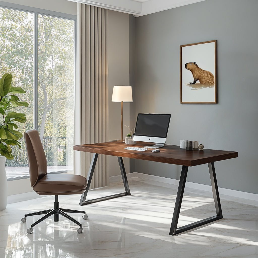 A modern desk with a dark wood top and metal legs in a home office setting, accompanied by a swivel chair, lamp, and decorative painting on the wall.