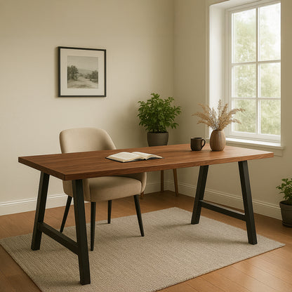 Wooden desk with chair in a room with a window and plants
