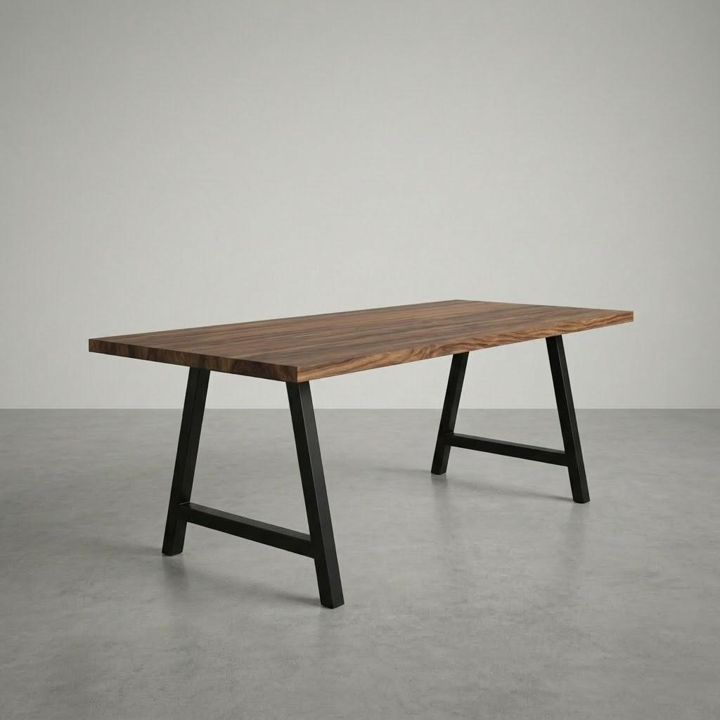 Wooden table with black metal legs on a gray floor and background