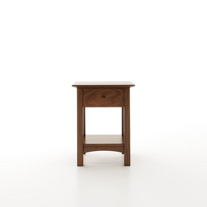 A shaker nightstand made of walnut featuring one drawer and one lower shelf on a white background