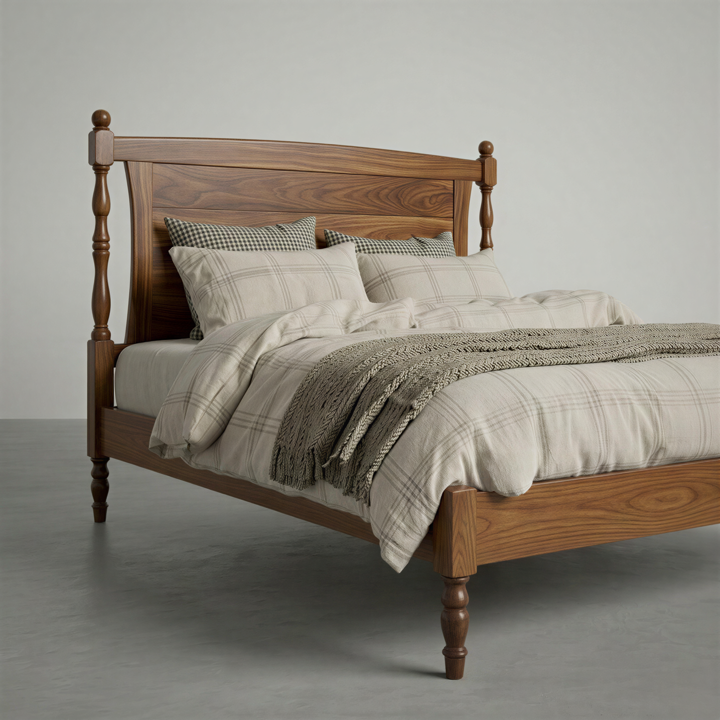 Wooden bed with plaid bedding on a gray background