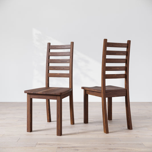 Two walnut wood Heisly dining chairs with a commercial grade finish, displayed against a white background.