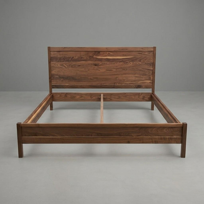 A wooden bed frame with a matching headboard, made from dark brown wood with visible grain patterns, photographed against a neutral gray studio background.