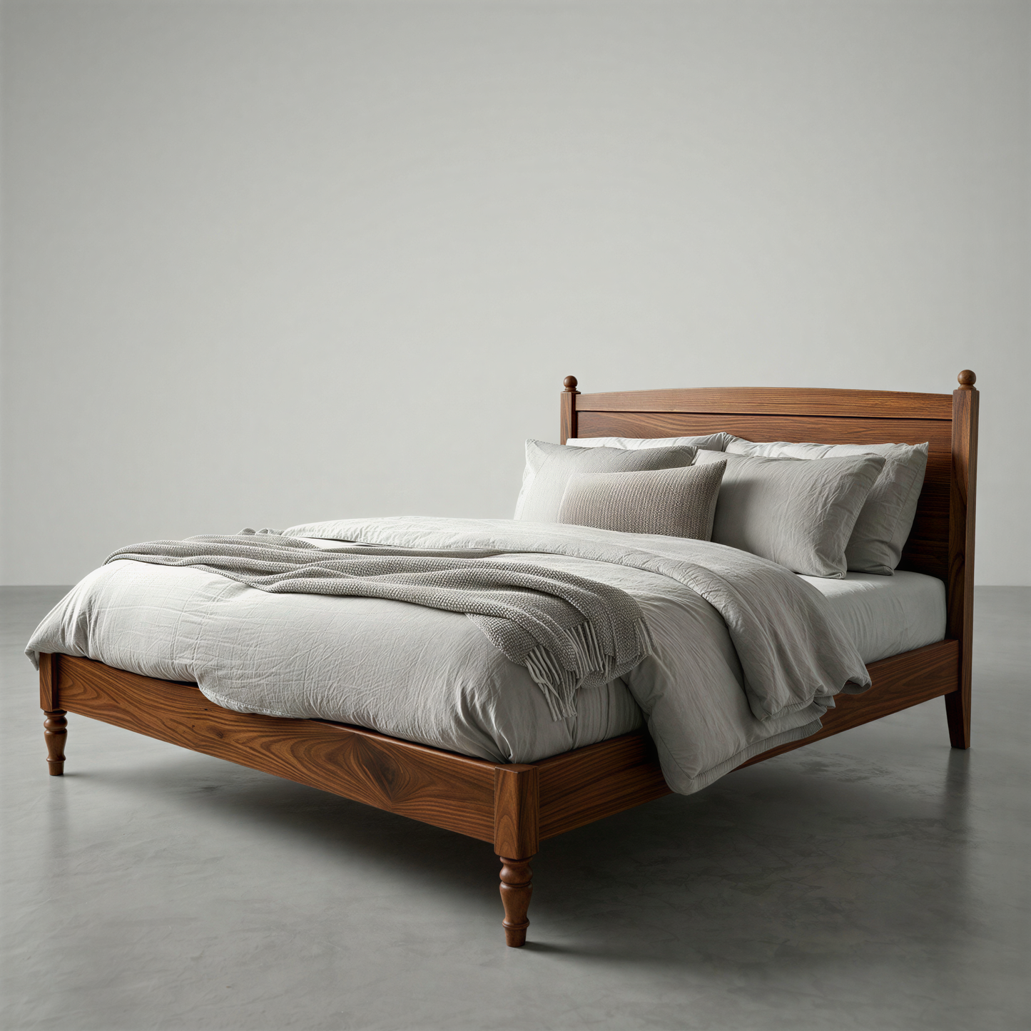 Wooden bed with white bedding against a gray background