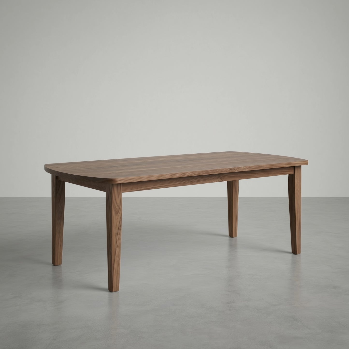 walnut dining table in a large empty space