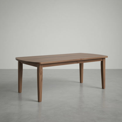 walnut dining table in a large empty space