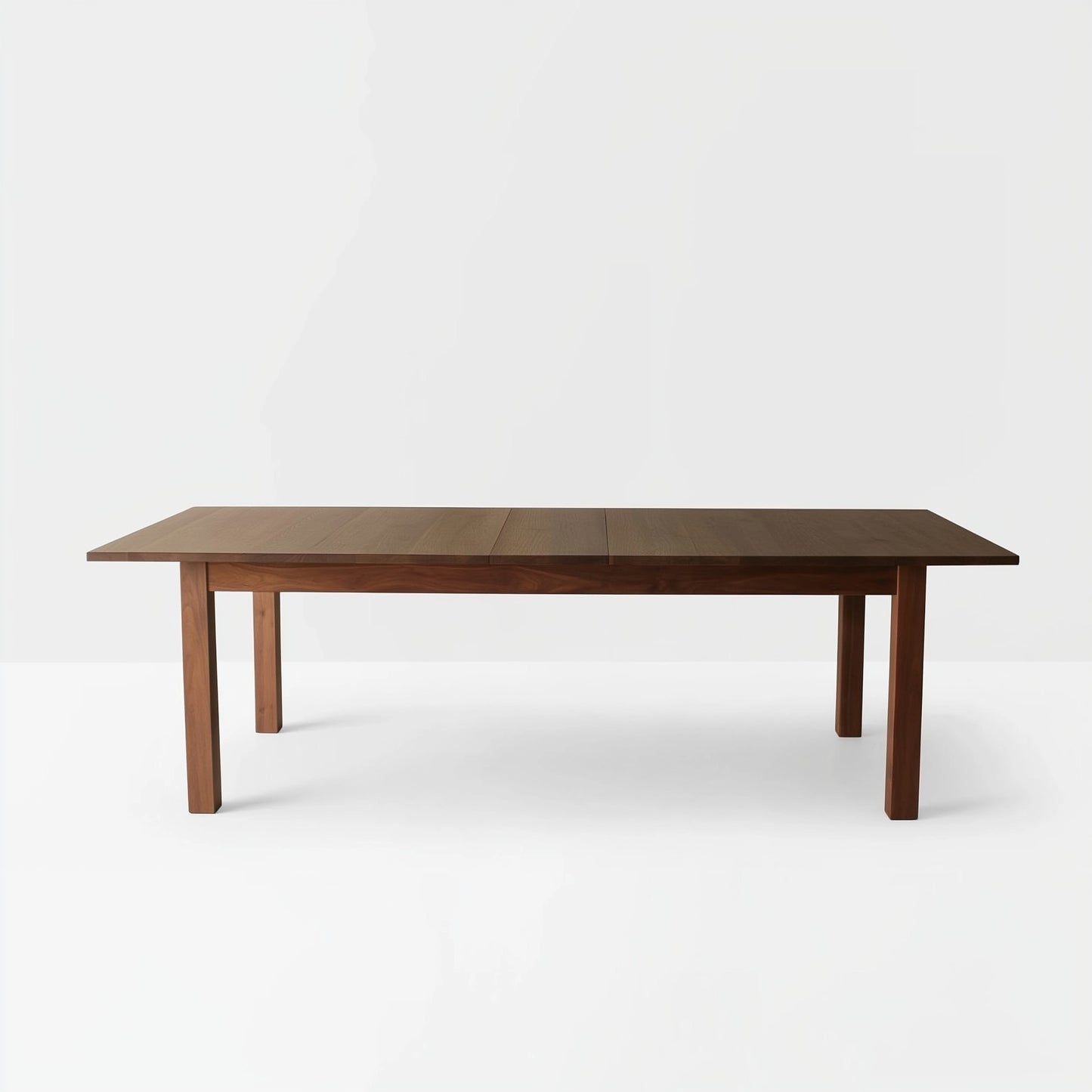 Wooden dining table on a white background
