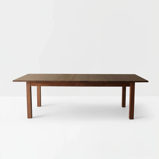 Wooden dining table on a white background