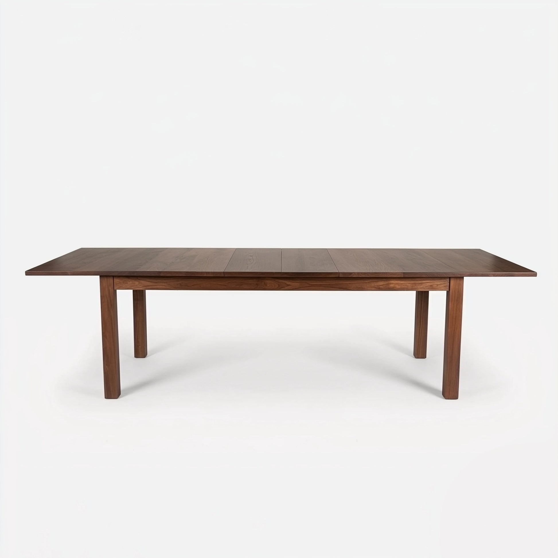 Wooden dining table on a white background