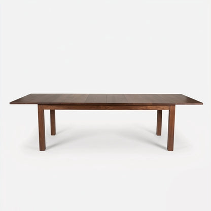 Wooden dining table on a white background