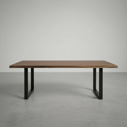 Wooden table with black metal legs on a gray background