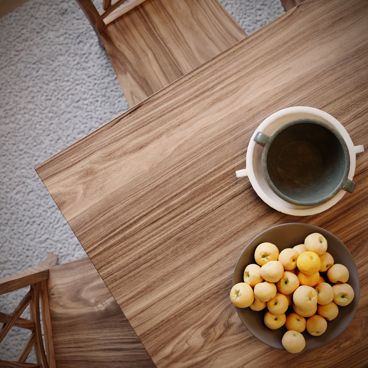 top down view of a walnut dining table