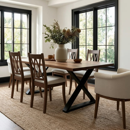 Dining room with wooden table and chairs in a well-lit room.