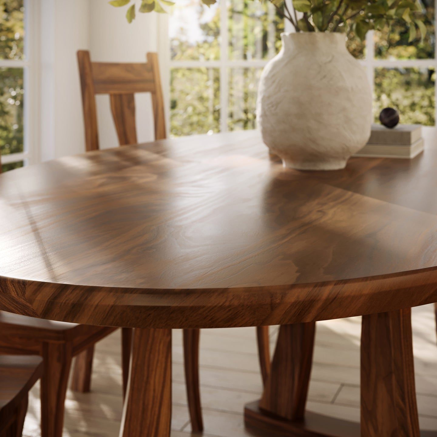 Corner view of a walnut oval dining table