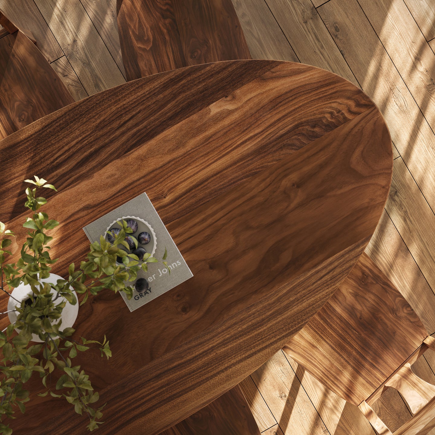 Top down view of a walnut oval dining table